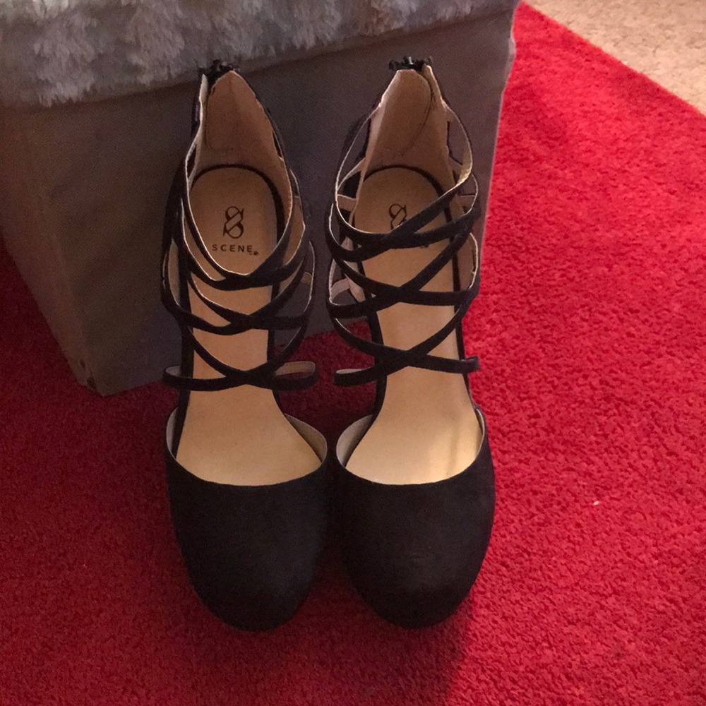 Black closed toe crisscross wedge